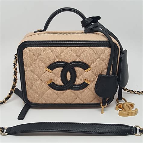 chanel filigree vanity case beige black|chanel vanity case original.